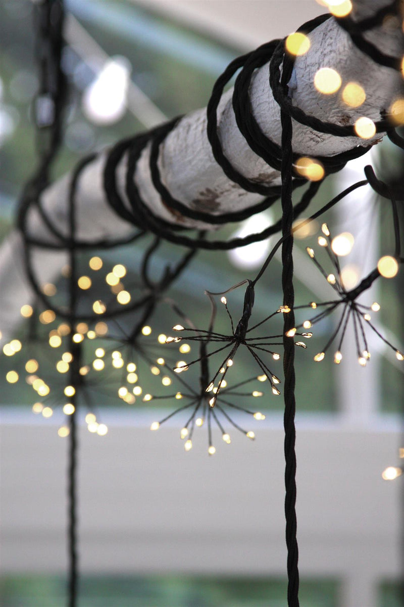 Solar Starburst Chain - 150 LED Outdoor Light Garland/10 Ornaments - Black